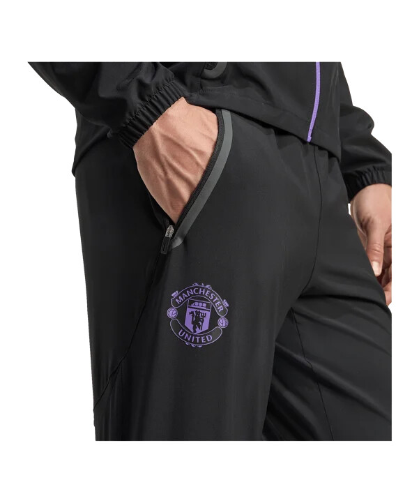 adidas manchester united vis tech travel hlače za trčanje crne